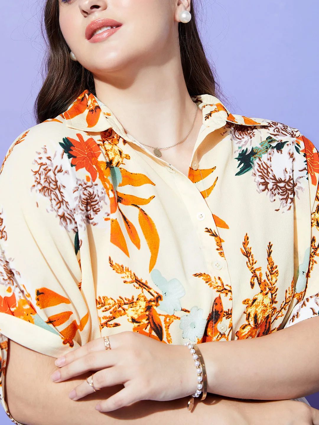 Berrylush Women Plus Size Beige & Orange Floral Printed Spread Collar Neck Batwing Sleeve Polyester Curved Hem Regular Shirt