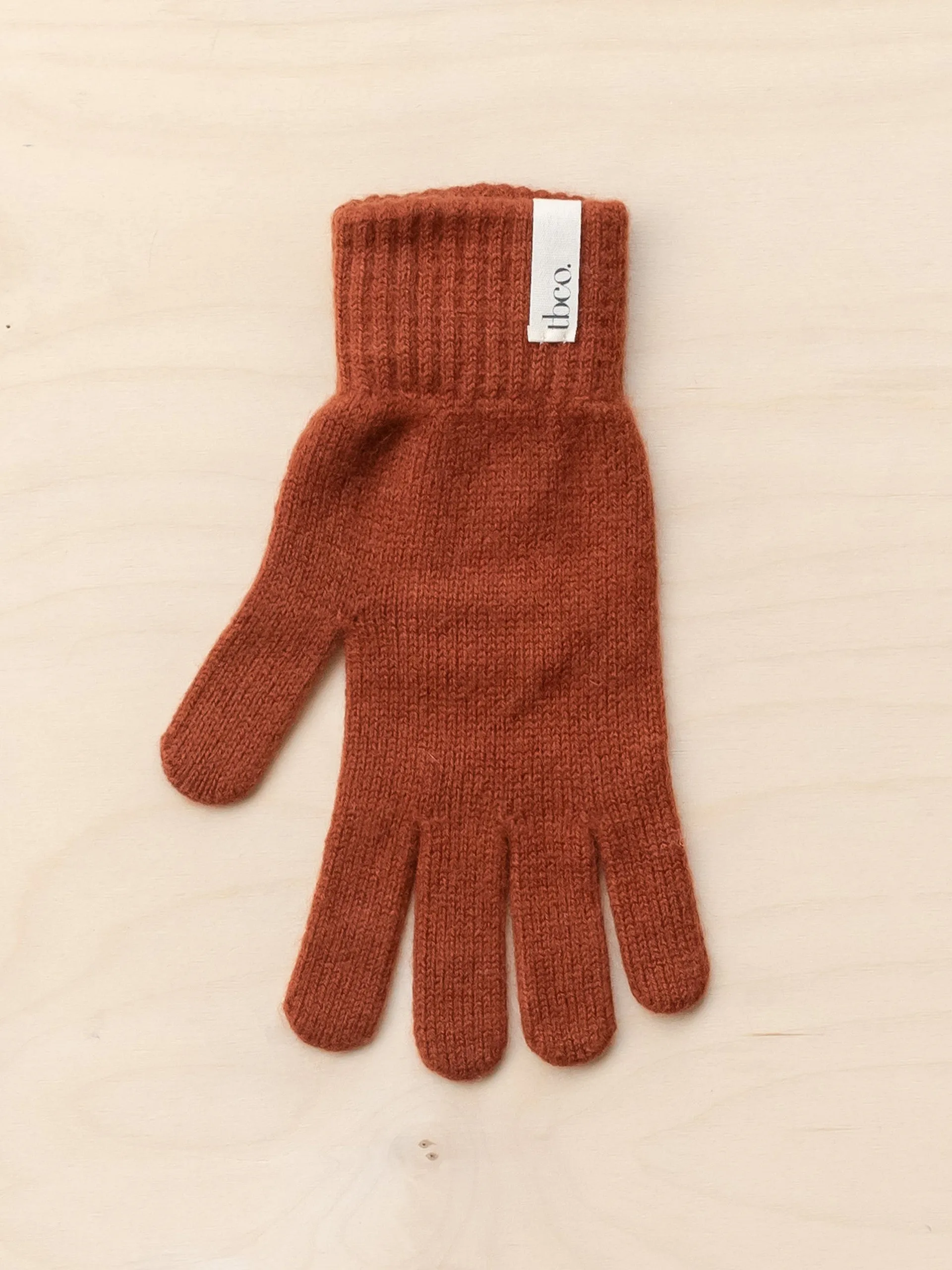 Cashmere and merino gloves in rust