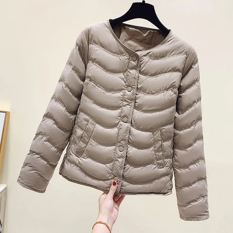 The inner tank keeps warm and light small cotton clothes for women's autumn and winter new 2024 round neck short cotton jacket for small people to wear cotton clothes outside