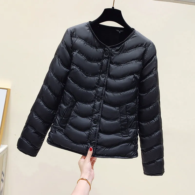 The inner tank keeps warm and light small cotton clothes for women's autumn and winter new 2024 round neck short cotton jacket for small people to wear cotton clothes outside