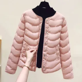 The inner tank keeps warm and light small cotton clothes for women's autumn and winter new 2024 round neck short cotton jacket for small people to wear cotton clothes outside