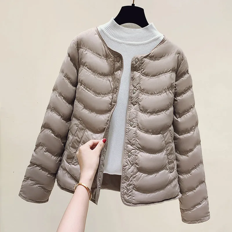 The inner tank keeps warm and light small cotton clothes for women's autumn and winter new 2024 round neck short cotton jacket for small people to wear cotton clothes outside